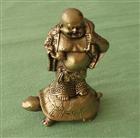 Buddha bohatství na želvě - (soška buddhy stojícího na želvě)
